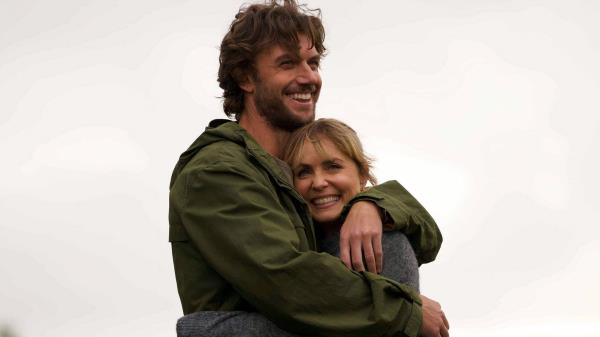 Adam Demos hugs Radha Mitchell in Take My Hand